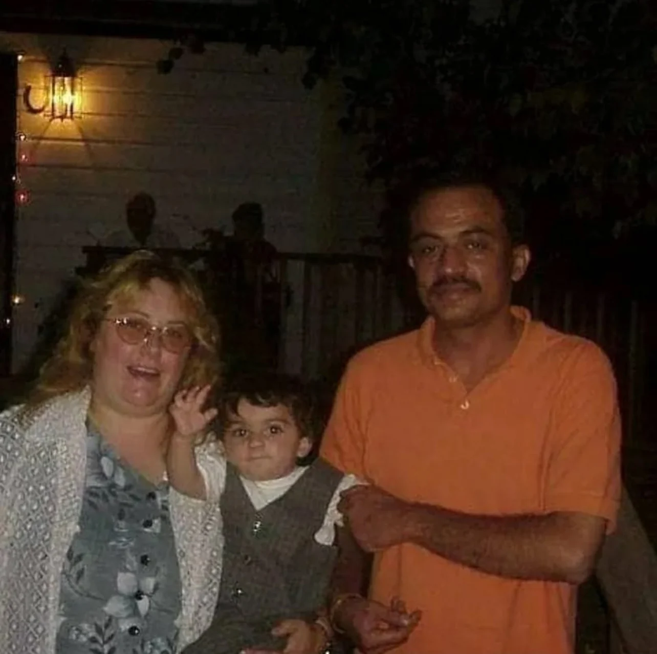 Arick Manocha as a child with his parents
